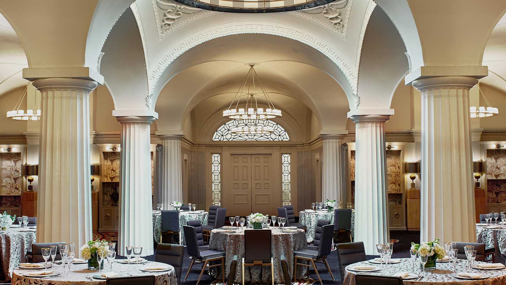 Paris ballroom featuring domed ceilings and classical columns
