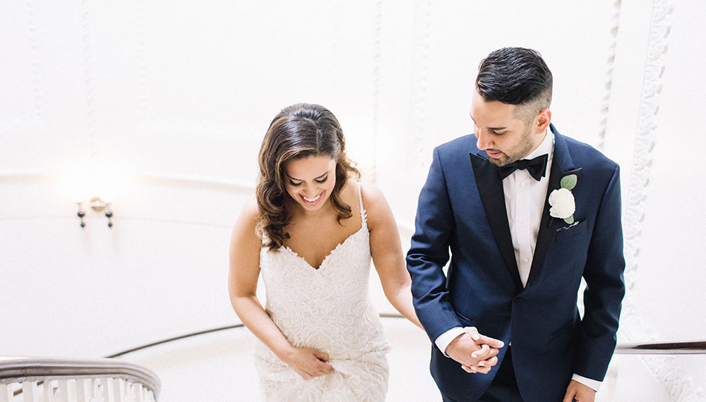 Bride & Groom ascending stairs