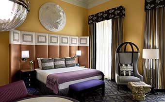 Monaco DC guestrooms feature a lion head medallion
