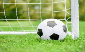 soccer ball in front of goal
