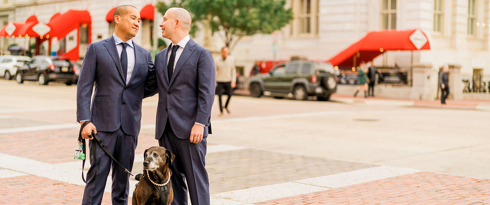 Newlyweds posing in DC with their dog